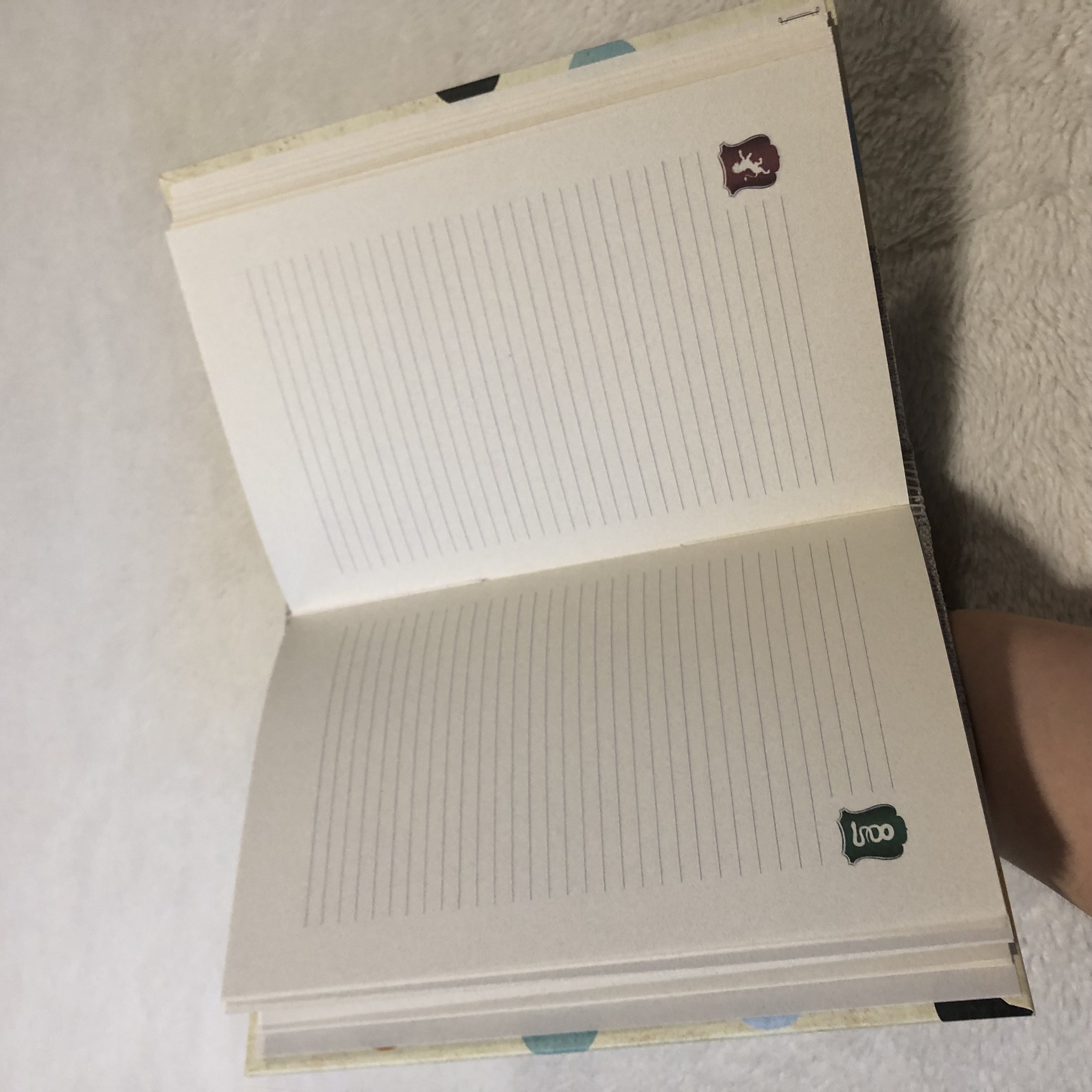 Buttonhole 4 Crest Notebook - open
