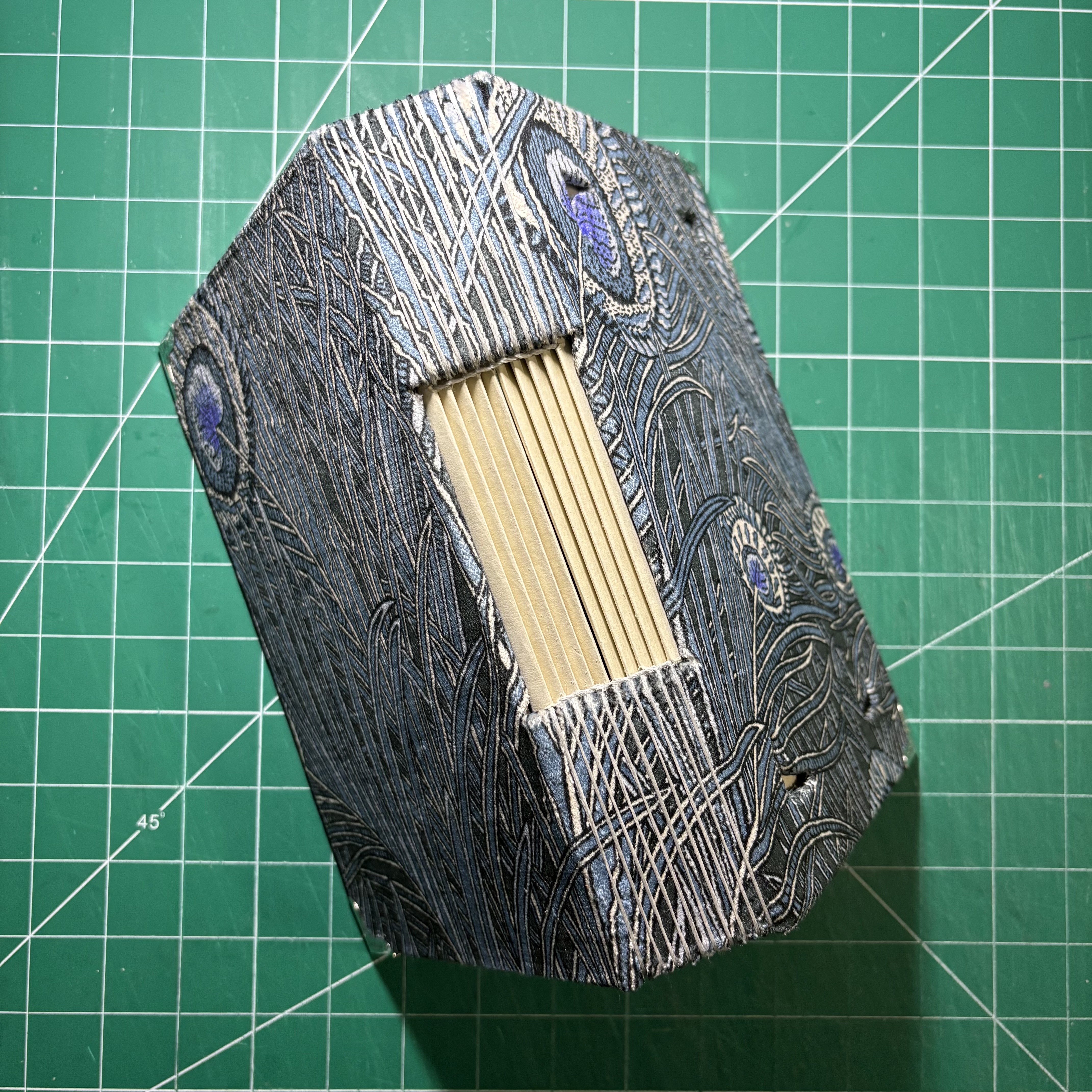 Buttonhole Hera Feather Notebook - spine